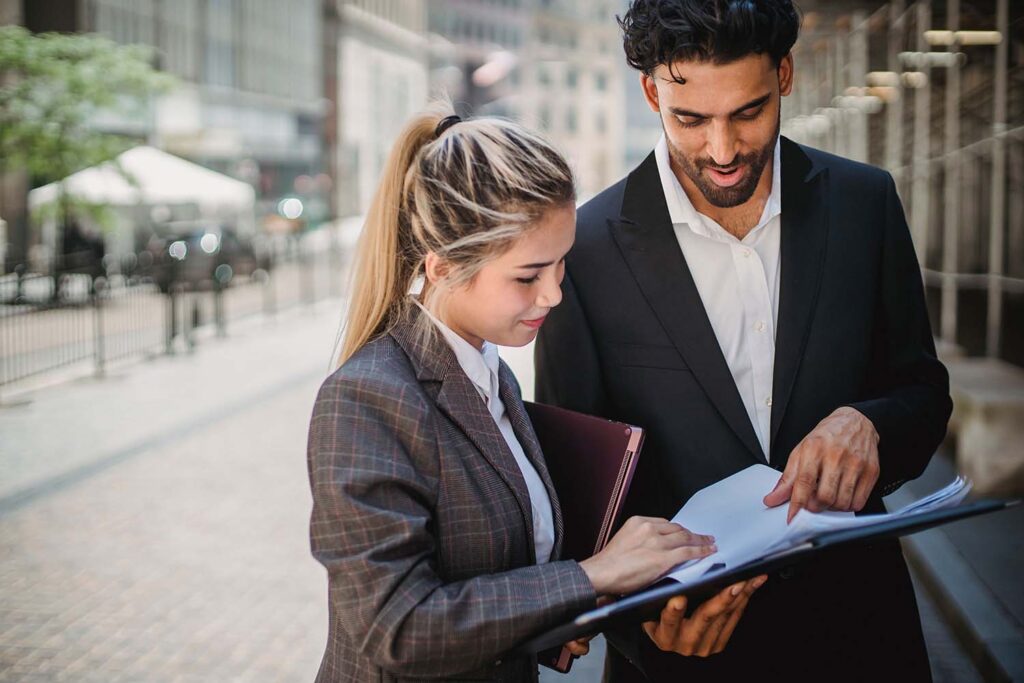 Two people studying the equality act
