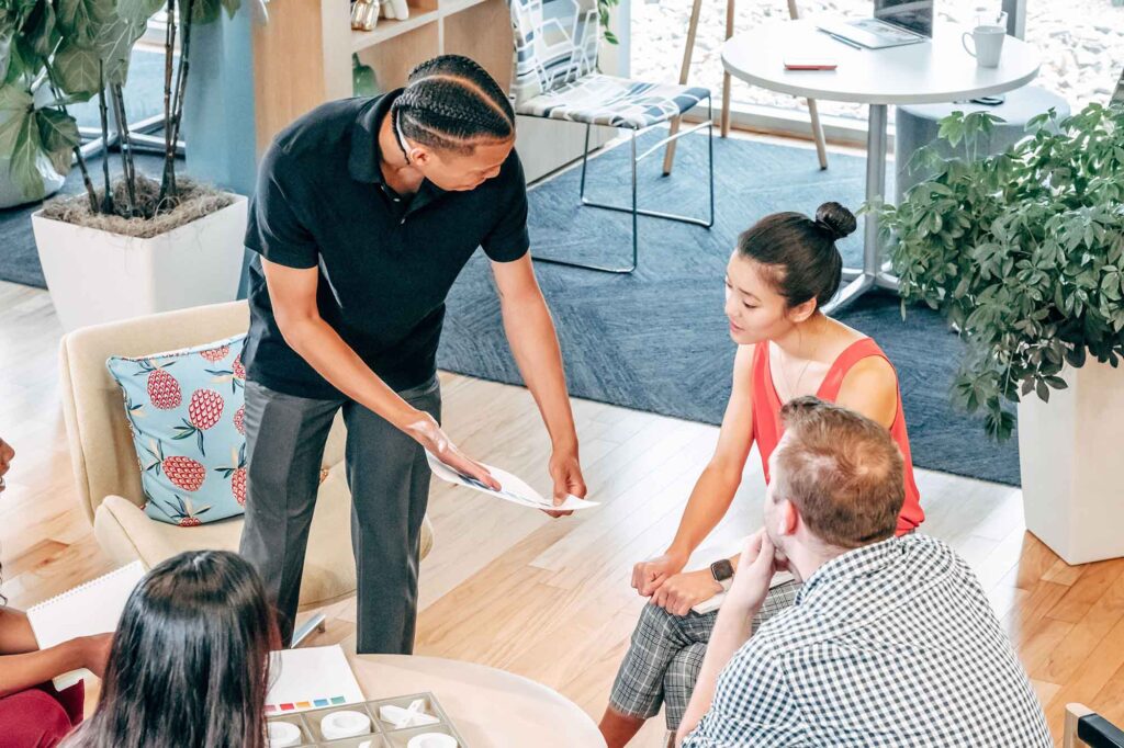 office team discussion meeting about their employer brand